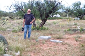 Contemplating the family cemetery (photo by Laurel Parrott)